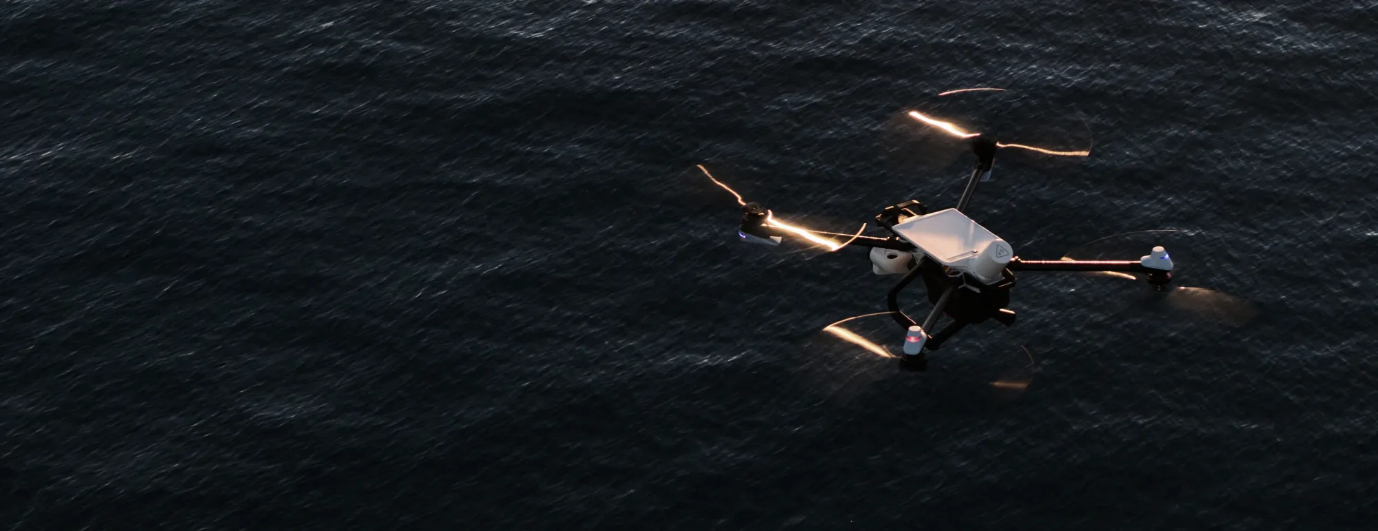 A BRINC public safety drone in flight over water